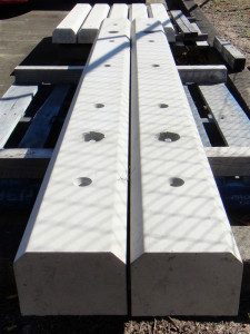 Concrete Truck Stops - 2500mm long, 150mm high, 200mm wide. Each Truck Stop has 5 (25mm) holes and 2 lifters cast in. 1700mm long, 100mm high, 150mm bottom, 130mm top (meets Australian Standards)